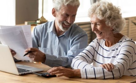 a couple learning how to manage their debt in retirement
