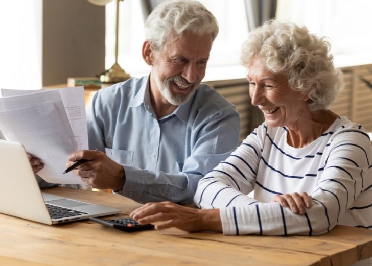 a couple learning how to manage their debt in retirement