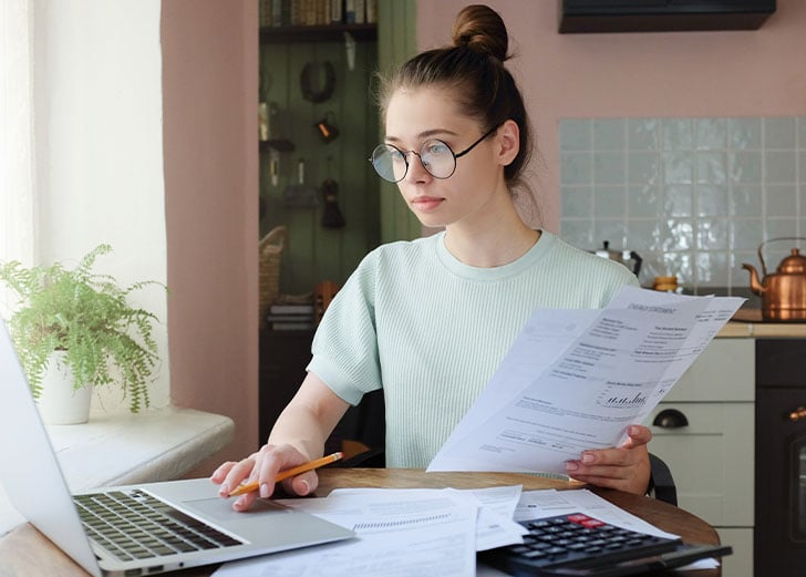 student looking over student debt relief