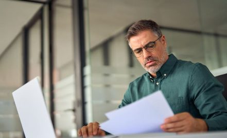a man reviewing tax bracket management tips