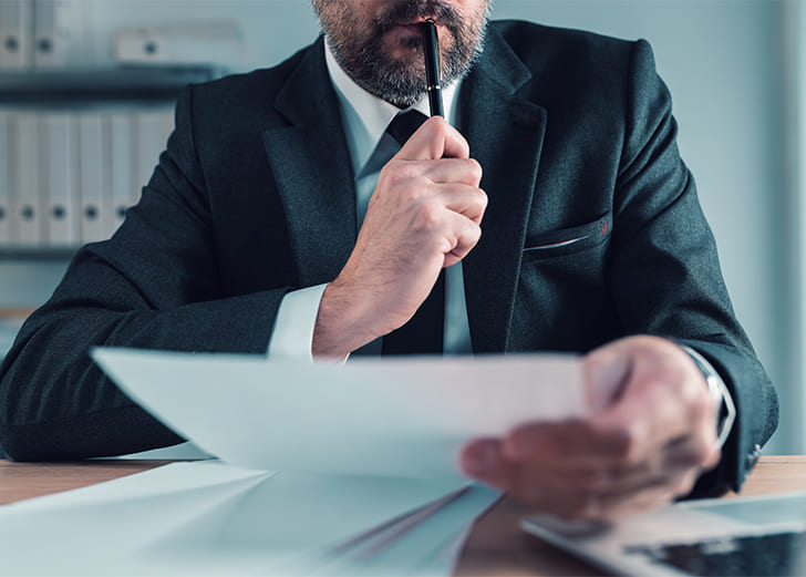 a fiduciary agent reading a paper