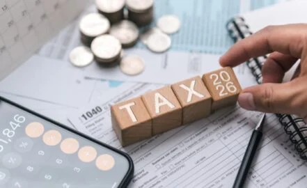 Wooden blocks with the word tax