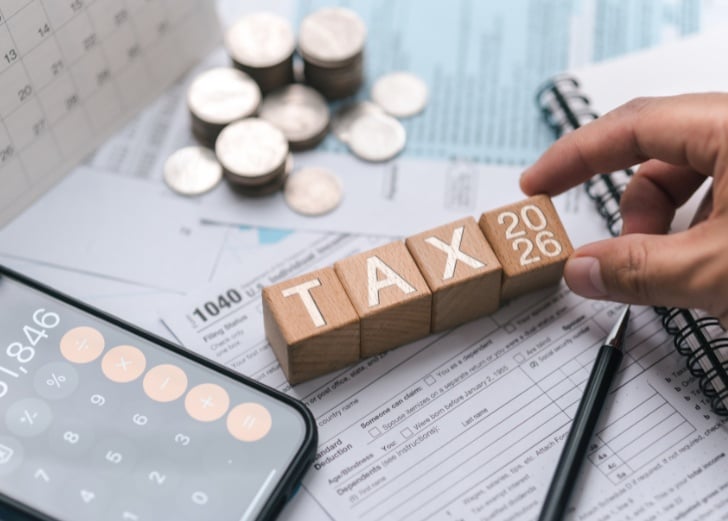 Wooden blocks with the word tax